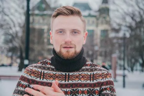 A man in a sweater at outside Stock Photos