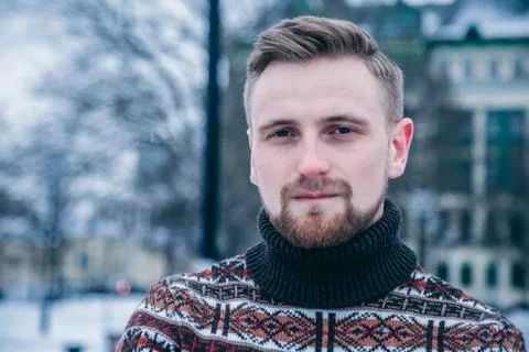 A man in a sweater at outside Stock Photos