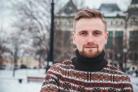 A man in a sweater at outside Stock Photos