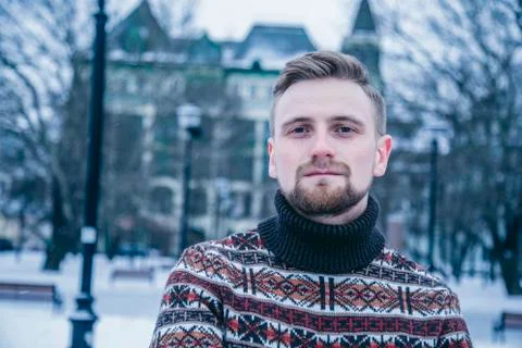 A man in a sweater at outside Stock Photos