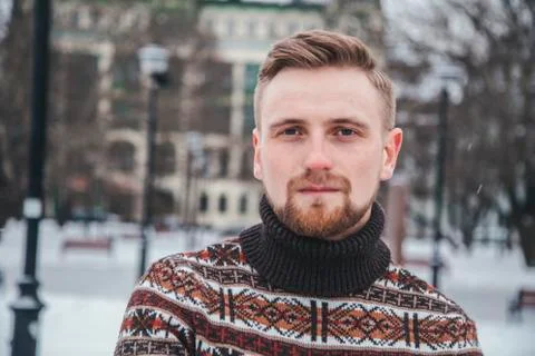 A man in a sweater at outside Stock Photos