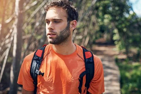 Man, sweating and exercise break in forest with fitness, explore outdoor an.. Stock Photos