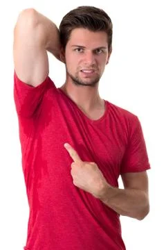 Man sweating very badly under armpit and pointing there Stock Photos