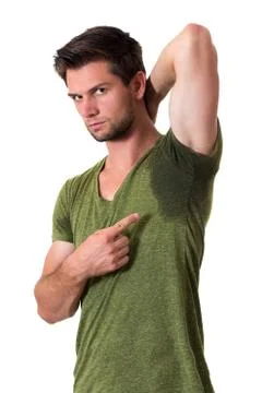 Man sweating very badly under armpit and pointing there Stock Photos