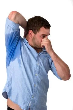 Man sweating very badly under armpit Stock Photos