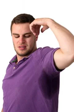 Man sweating very badly under armpit Stock Photos