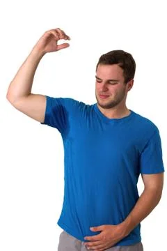 Man sweating very badly under armpit Stock Photos