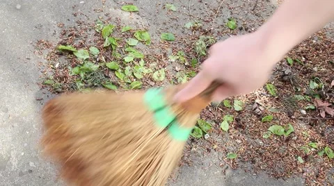 Man Sweeping Ground With A Broom Stock-Footage 48843808