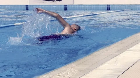 Man swiming in the pool Stock Footage 201271734