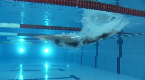 Man swimmer jumping in the swimming pool - underwater shot Stock Footage 30458482