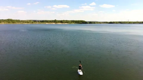 Man is swimming on the board 動画素材 130493622