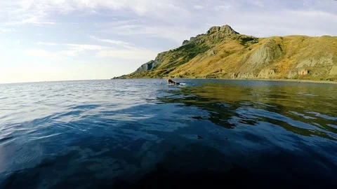 The man is swimming with a crawl Video stock 80977998