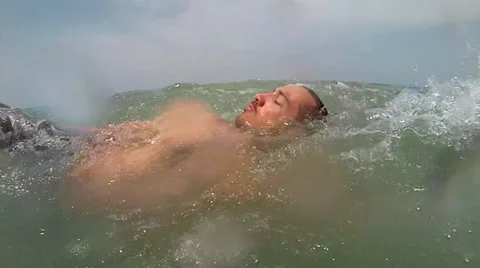 Man swimming in ocean. Stock Footage 27305874