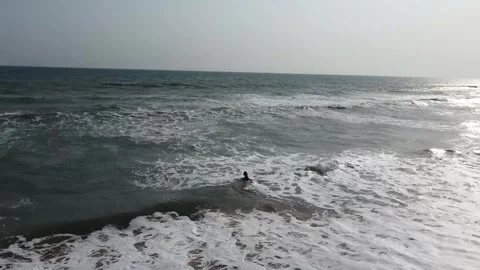 Man swimming in the Ocean Stock Footage 245232542