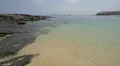 Man swimming on the ocean shore in Panama 4k or 4k+ Resolution
