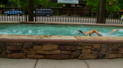 Man swimming in pool Stock Footage 57814252