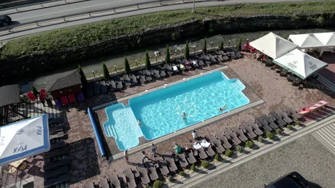 Man swimming in the pool overhead view Stock Footage 196605597