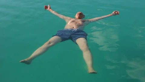 Man swimming in public pool Stock Footage 96161905