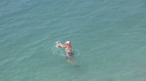 Man swimming in the sea 스톡 동영상 8678412