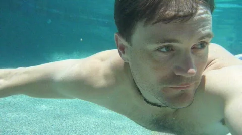 Man Swimming Underwater in Pool Stock Footage 736151