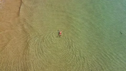 A man swims Stock Footage 137297513