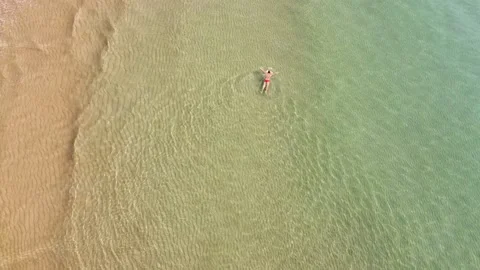 A man swims Stock Footage 137297562