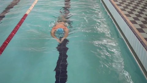 Man swims in the pool. Stock Footage 96459421