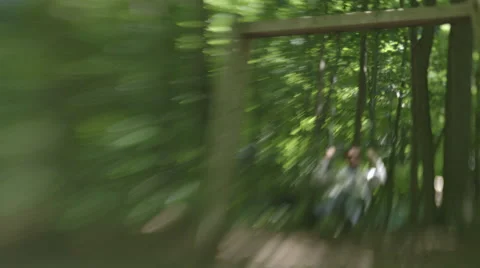 Man on Swing Stock Footage 63929446