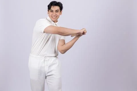 Man swinging an imaginary baseball bat. Stock Photos