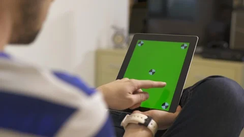 Man swiping the screen of a tablet Video stock 87383794