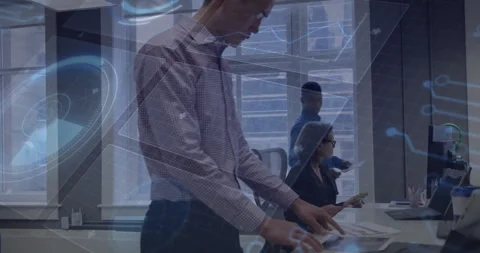 Man swiping touchscreen activating data overlays while coworker reviewing Stock Footage 311455585