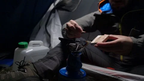 Man switch on a camp stove Video stock 84303143