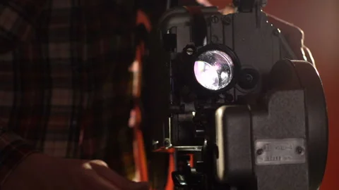 The man switches off the projector. Full HD Stock Footage 86201945
