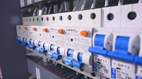 The man switching on the converters , circuit breakers. No face. Close-up. 4K Video stock 75522022