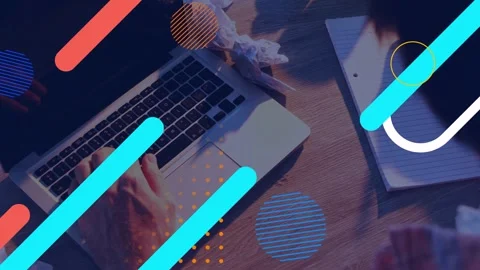 Man switching from typing to noting for study, typing causing graphics hiding Stock Footage 335235975