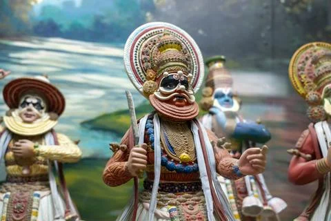 A man with a sword is standing in front of a group of people. in Chennai Stockfoto's