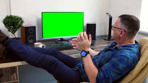 Man synchronising data with his mobile Stock Footage 109180046