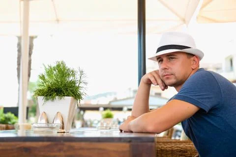 Man at a table in a cafe Stock Photos