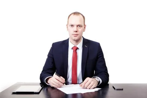 The man at the table with the tablet before signing the contract Foto stock