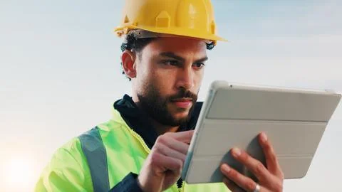 Man, tablet and construction worker outdoor with PPE, check project schedul.. Stock Photos