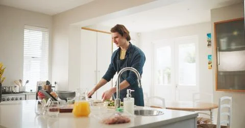 Man, tablet and meal prep with internet, recipe tutorial or online guide in home Stock Photos