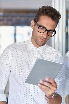 Man, tablet and proofreading in office for startup, schedule or review agen.. Stock Photos