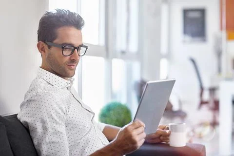Man, tablet and reading in office for journalist, schedule or review agenda.. Stock Photos