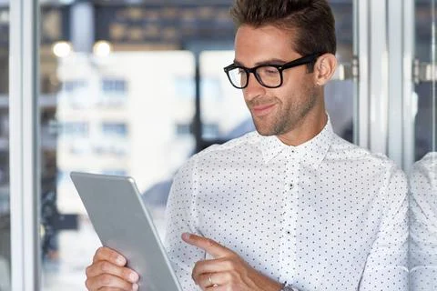Man, tablet and reading in office for startup, schedule or review agenda fo.. Stock Photos