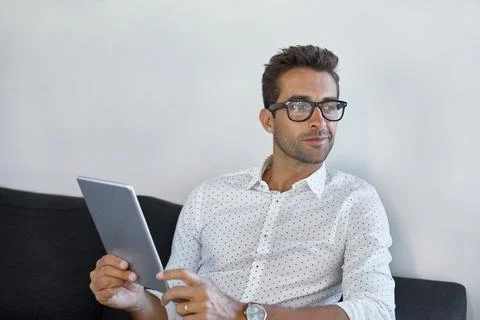 Man, tablet and thinking in office with schedule, reading or review agenda .. Stock Photos