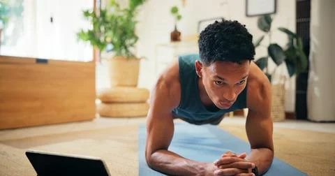 Man, tablet and tutorial for plank exercise, online course or balance with Stock Photos