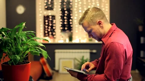 Man with the Tablet in a Beautiful Interior Stock Footage 48675840