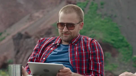 Man with Tablet on Camping Trip Stock Footage