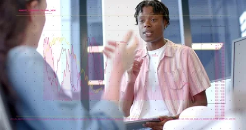 Man with tablet checking data and replying after woman gesturing, charts dotted Stock Footage 332468072