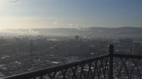 Man with tablet computer on the background of the urban landscape in winter Stock Footage 61179152